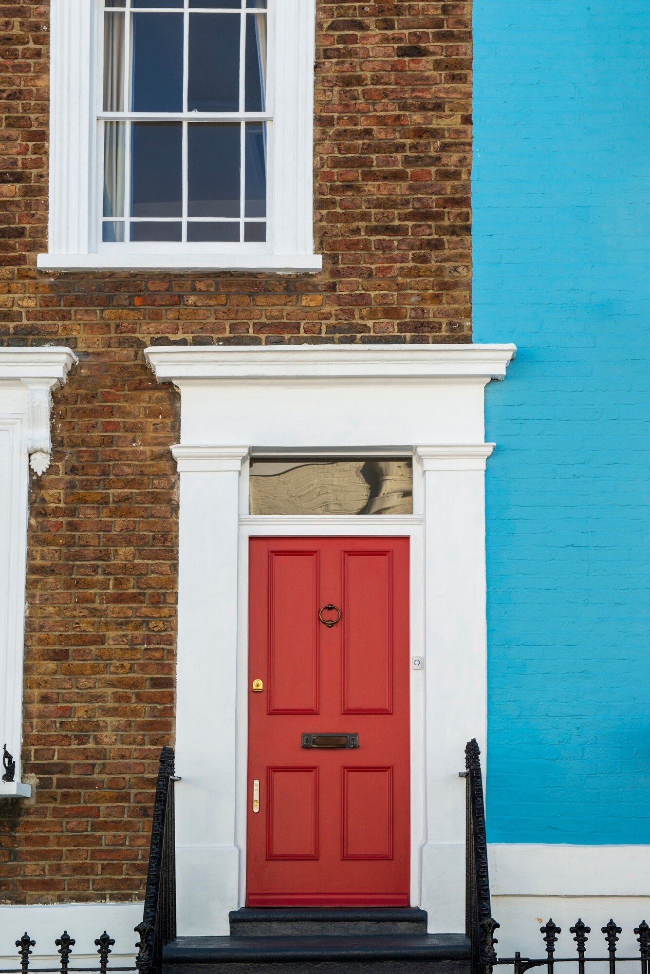 front-view-front-door-with-blue-brown-wall_23-2149360600