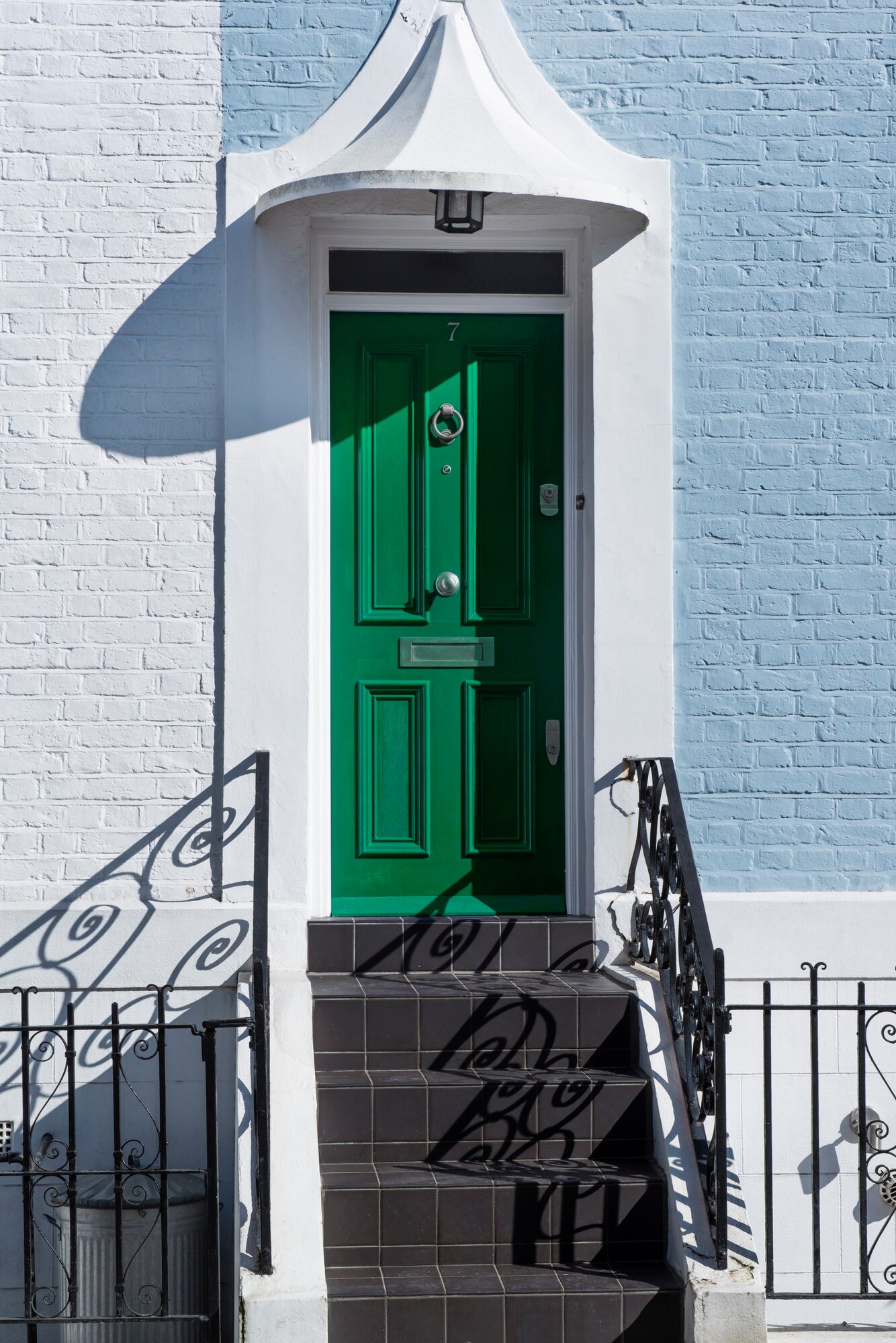 front-view-front-door-with-white-blue-wall_23-2149360613